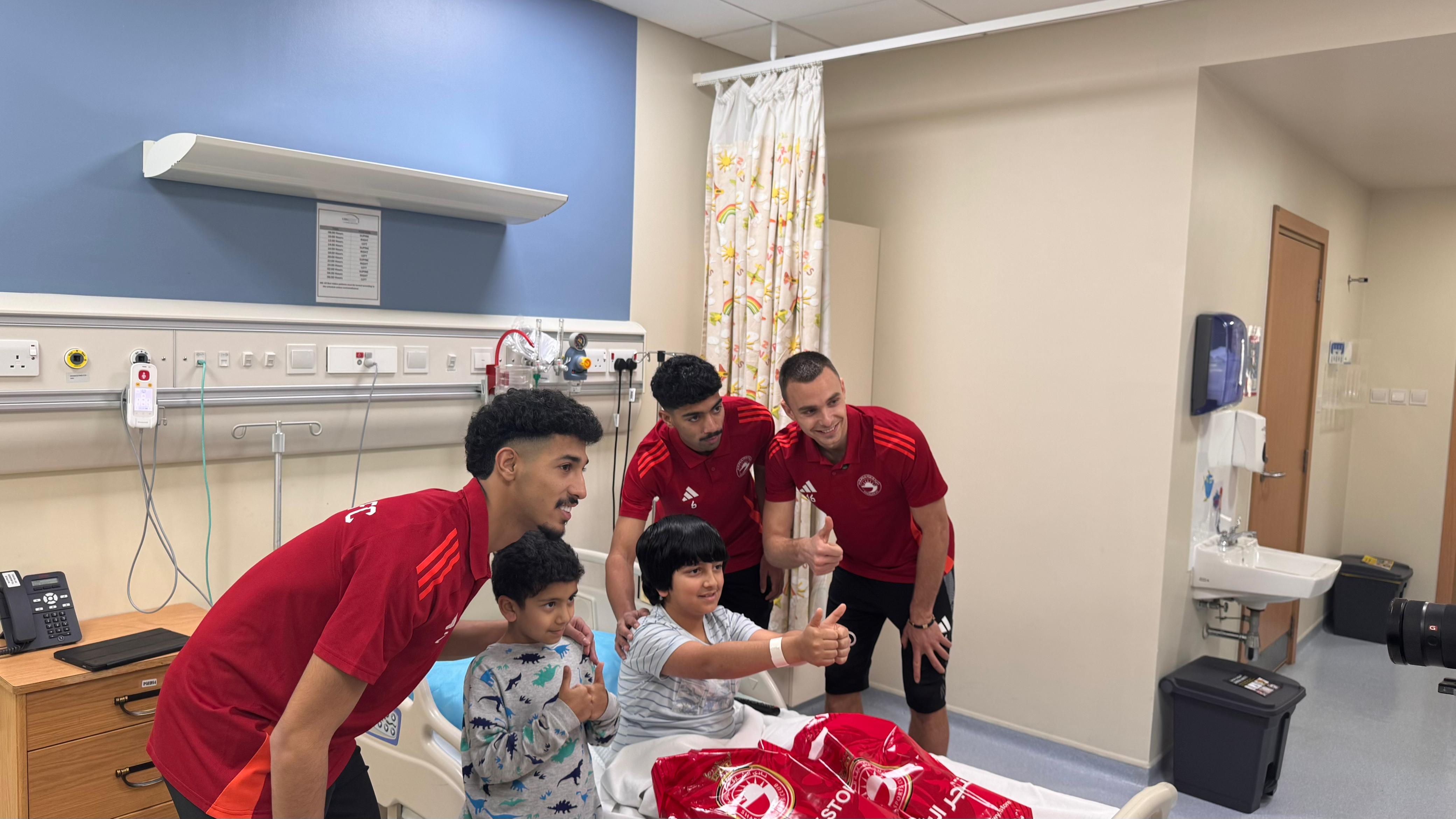 Sharjah Sports Club Players Visit University Hospital Sharjah